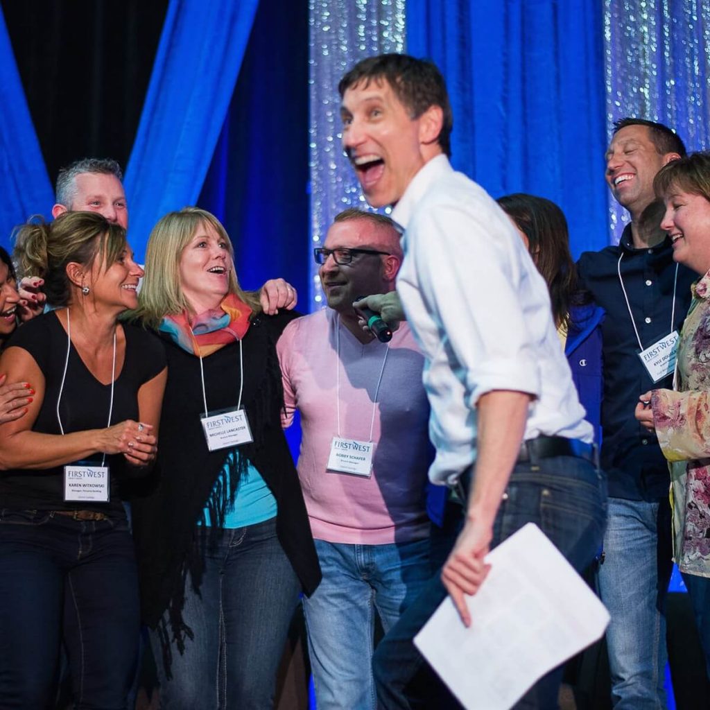 corporate retreat_03_on_stage_group_moment