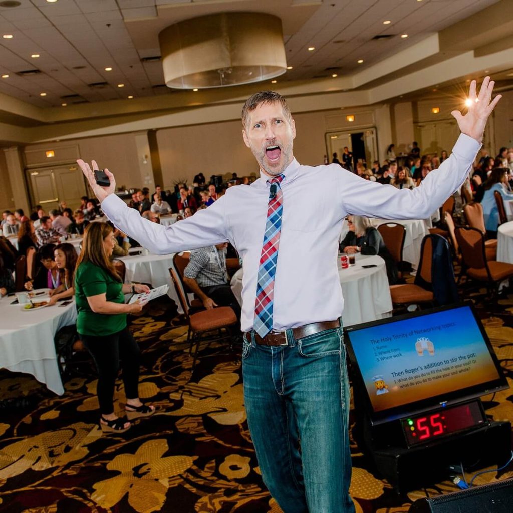 roger-haskett-corporate-keynote-speaker_07_arms_wide_ballroom